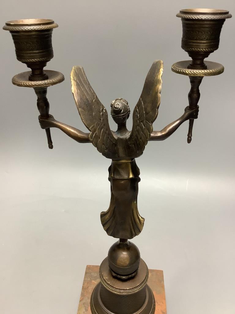 A pair of modern bronze figural two sconce candlesticks, height 32cm